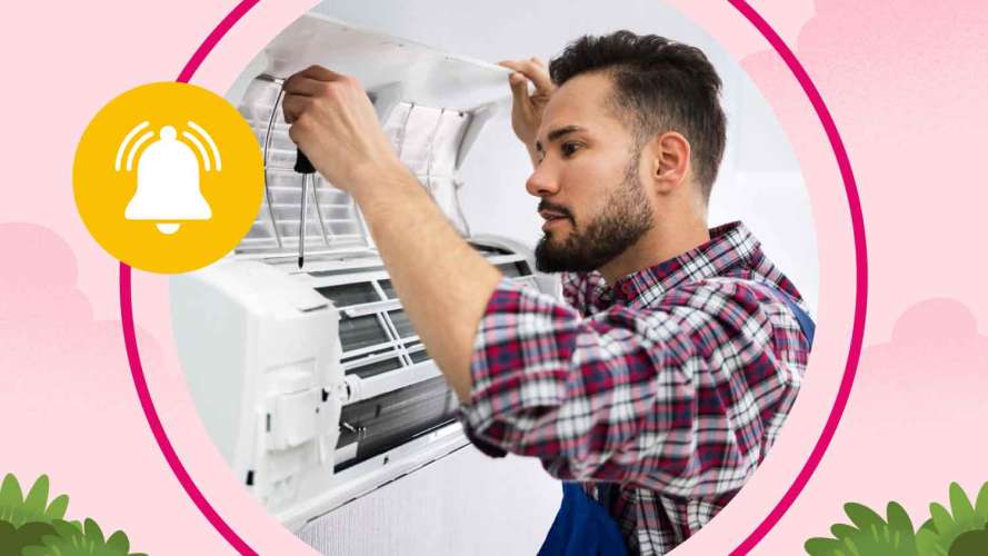 A male field service technician in a plaid shirt performs proactive maintenance on an A/C unit.